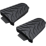 Shimano SPD-SL cleat covers for protection and traction, showing black rubber covers with Shimano branding for cycling shoes.