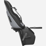 Thule Yepp Nexxt 2 Maxi rack mount child bike seat with safety harness and padded seat for kids, designed for secure cycling.