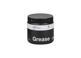 Bontrager bicycle grease lubrication container showing waterproof, low friction formula for bike maintenance and carbon fiber compatibility