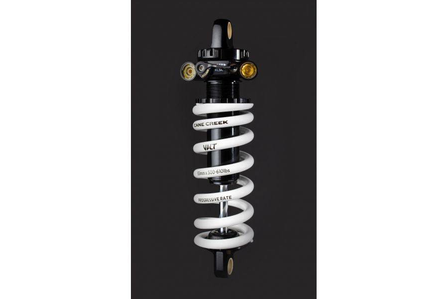 Cane Creek Valt Progressive Spring for rear shock suspension upgrade, showing the coil spring with branded labeling.