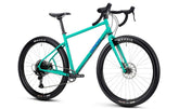 Genesis Vagabond 20 LT gravel bike with 12-speed SRAM Apex XPLR drivetrain, black frame and knobby tires, ready for off-road adventures