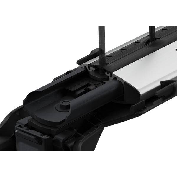 Thule WingBar Edge Evo single roof rack bar with aerodynamic, low-noise design, shown mounted on vehicle roof in black finish.