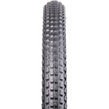 Nutrak Chaos MTB tyre mounted on a bike wheel, designed for cross country trails with durable rubber for dry, hard-packed terrain.