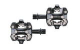 Trek Kovee Elite black clipless pedal set with 9/16" spindle for cycling performance, shown in close-up image.