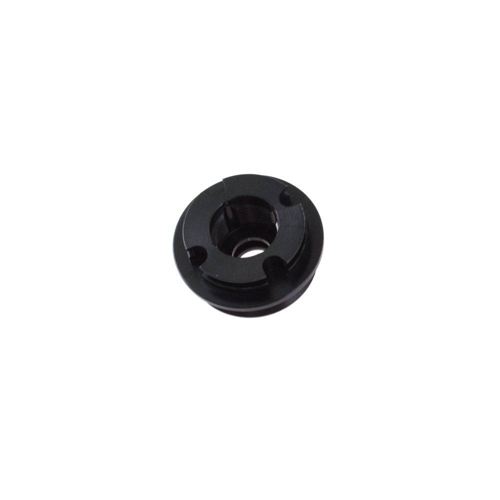 Fox Shock Float DPX2 end cap rebound side replacement component, showing the small metal part used in mountain bike shock absorbers.