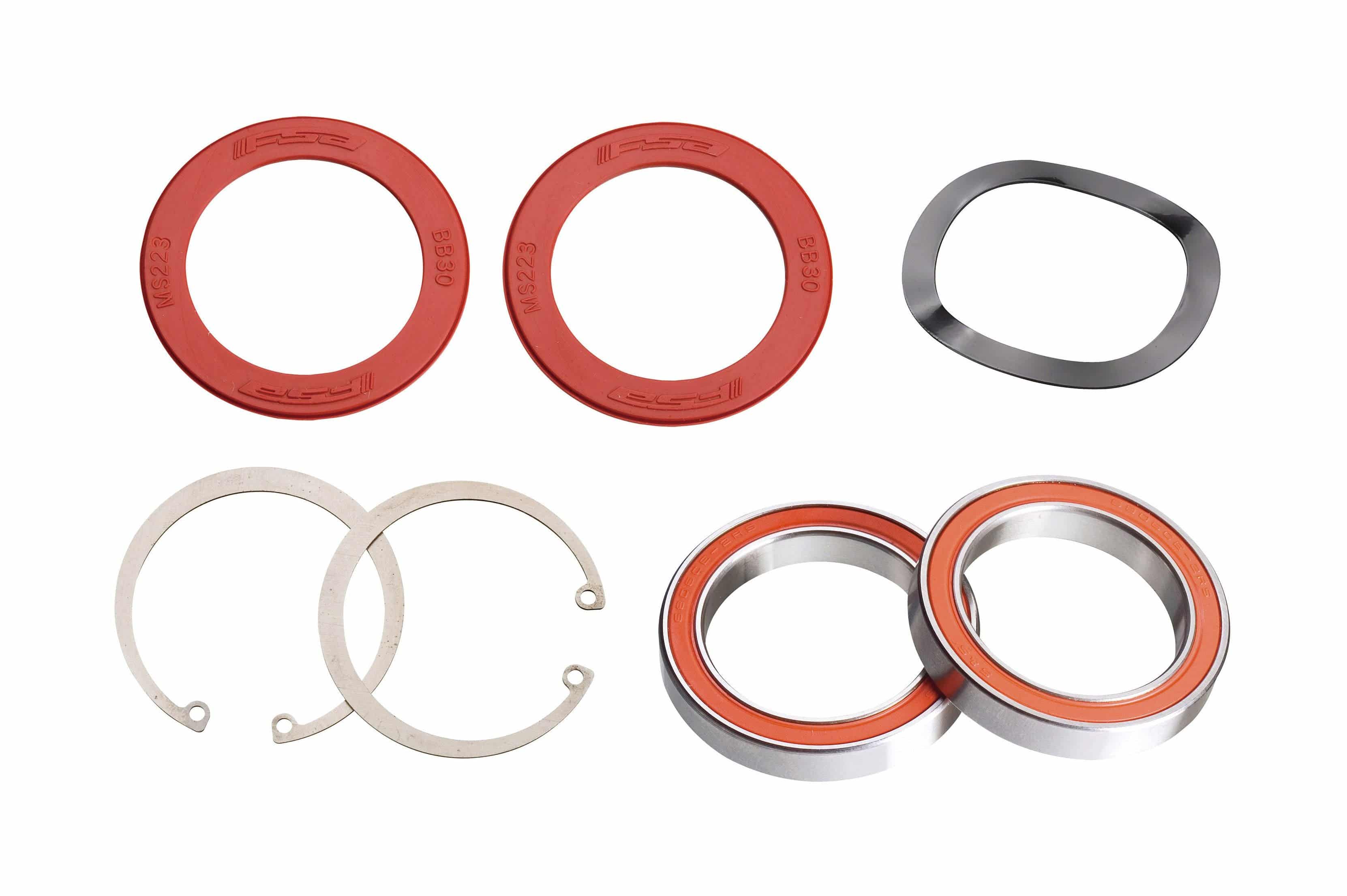 FSA BB30 Road ceramic bottom bracket with bearings and installation accessories, showing the component and related hardware.