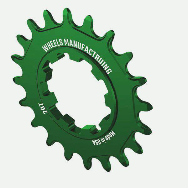 Wheels Manufacturing Solo-XD 20-tooth green aluminum bike cog for SRAM XD/XDR drivetrains, shown on a bike wheel.