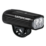 Lezyne Mega Drive 2400+ front bike light in black with 2400 lumens and USB-C charging port, mounted on a bike handlebar.