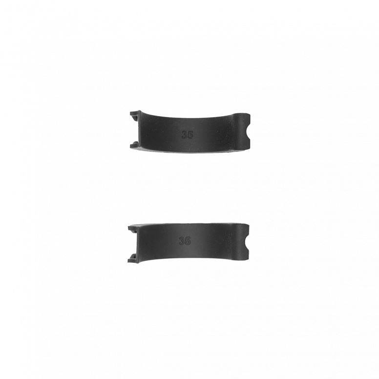 Pair of black Kids Ride Shotgun Kids Ride Shotgun 35mm rubber inserts for handlebar accessories, designed for kids' bike safety.