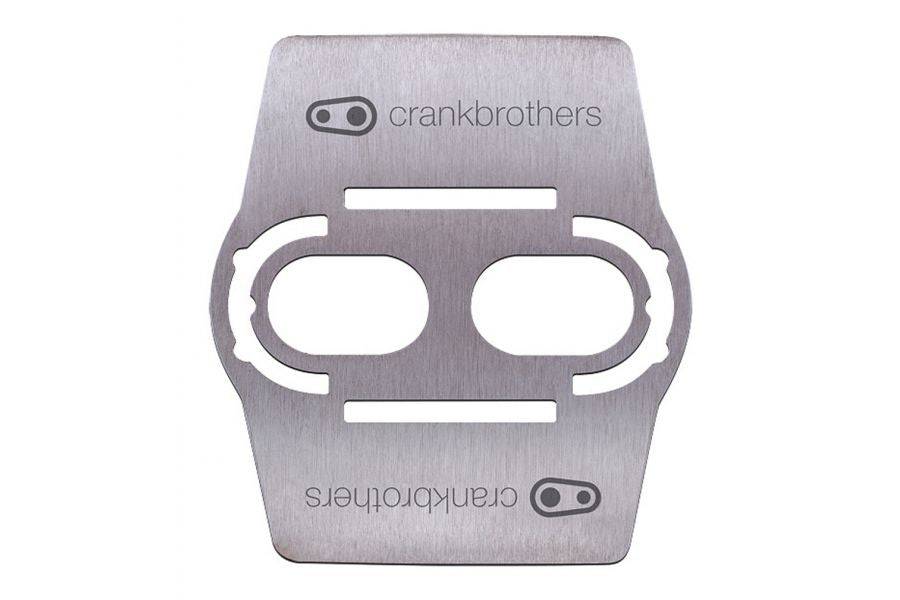 Crankbrothers MTB pedal shoe shields with durable carbon sole protection in silver for bike cleats and pedal compatibility.