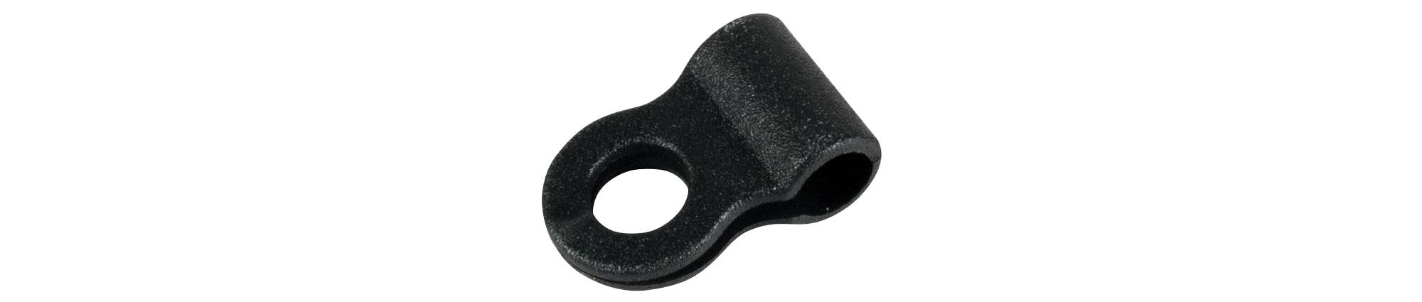 Black Trek plastic bolt-on single cable housing guide for bike cable management, showing the component attached to a bike frame.