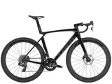 Trek Madone SL 6 AXS Gen 8 road bike with aerodynamic frame and electronic shifting, shown in a sleek cycling position.