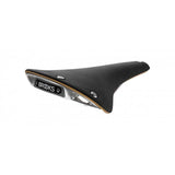 Brooks C17 Cambium organic bike saddle showing its waterproof, durable, maintenance-free design in a natural outdoor setting.
