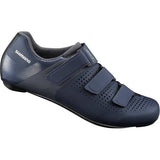 Shimano RC1 SPD-SL road cycling shoes with reflective straps, showing a sleek black design and secure closure system.