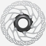 Shimano STEPS RT-EM300 160mm rear e-bike brake rotor with internal and external lockring, showing the metal disc and locking mechanisms.