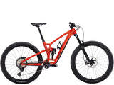 Trek Fuel EX 9.8 XT mountain bike with carbon frame and Shimano Deore XT drivetrain, ready for trail riding.