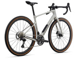 Giant Revolt Advanced 0 MY26 gravel bike with adjustable wheelbase and comfort features, shown with sleek frame and rugged tires.