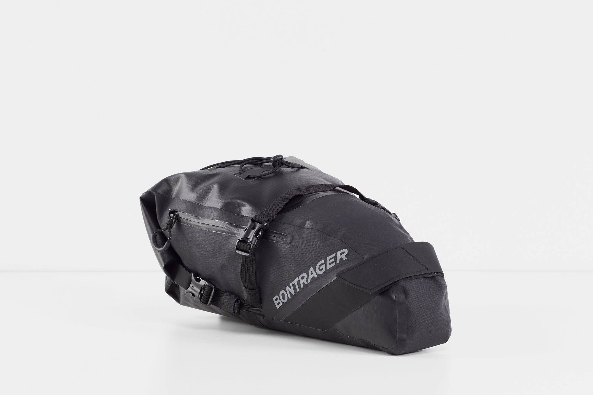 Bontrager Adventure 9L black water-resistant bike saddle bag with adjustable straps for secure bike storage.
