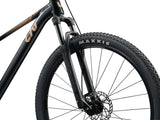 Liv Tempt 4 trail mountain bike with ALUXX aluminum frame and 27.5 or 29-inch wheels, suitable for off-road cycling adventures.