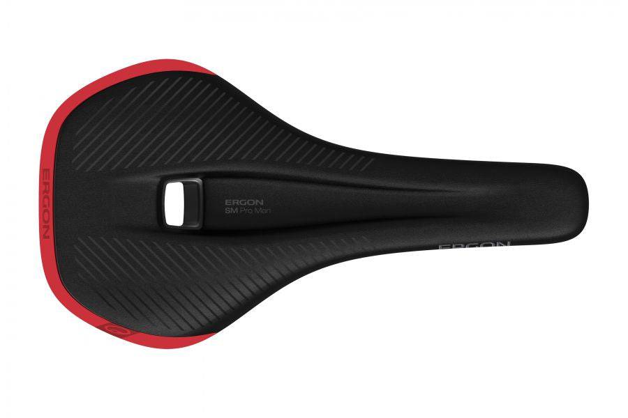 Ergon SM Pro Men mountain bike saddle with ergonomic pressure relief design, showcasing its streamlined shape and cushioning.