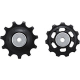Shimano CUES RD-U4020 U3020 tension and guide pulley set for mountain bike rear derailleur, close-up of components.