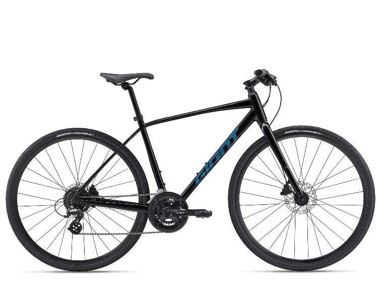 Giant Escape Disc 2 hybrid bike with Shimano Altus gears and disc brakes, 2025 model, shown with black frame and ergonomic saddle.