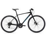 Giant Escape Disc 2 hybrid bike with Shimano Altus gears and disc brakes, 2025 model, shown with black frame and ergonomic saddle.