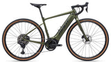 Giant Revolt E+ 1 2026 electric gravel bike with powerful motor and disc brakes, shown outdoors on a gravel trail.
