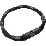ABUS 8808C/110 BK plastic-coated chain lock with combination for bike security, shown coiled with black plastic coating.