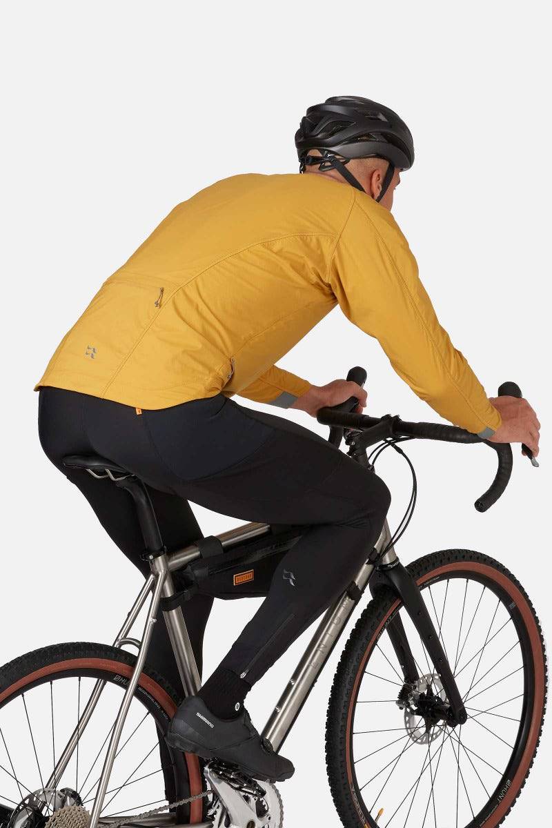Rab VR Cinder Softshell Cycling Jacket with Vapour-Rise™ technology, wind-resistant fabric, in a Sahara color, designed for outdoor cycling.