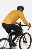 Rab VR Cinder Softshell Cycling Jacket with Vapour-Rise™ technology, wind-resistant fabric, in a Sahara color, designed for outdoor cycling.