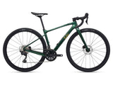 Liv Devote Advanced 2 women's gravel bike 2024 with Shimano GRX 820 and disc brakes, featuring a lightweight frame and knobby tires.