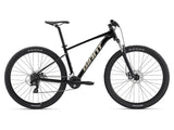 Giant Talon 4 mountain bike with large frame, Shimano Tourney gears, disc brakes, ready for off-road riding.