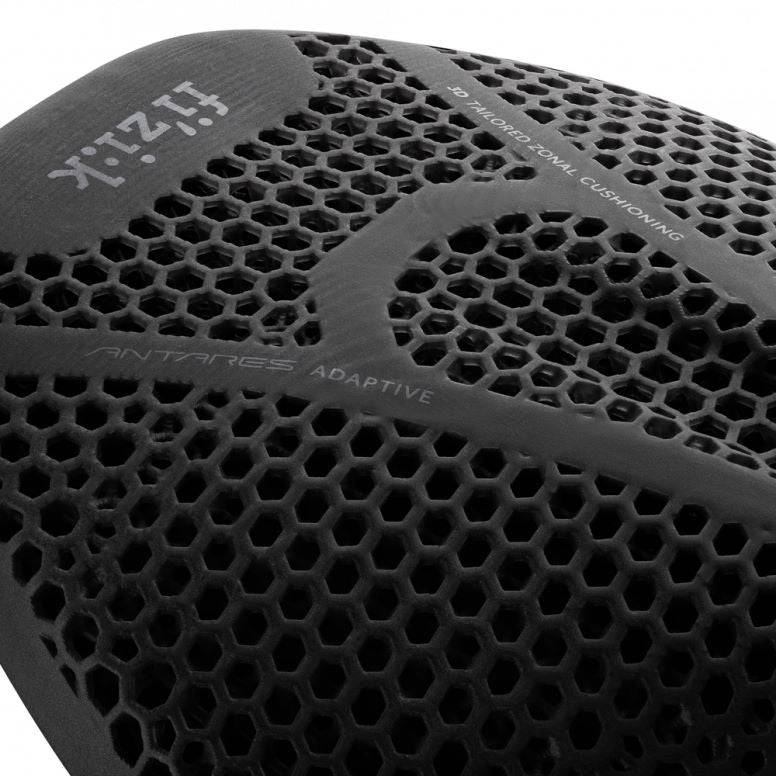 Fizik Vento Antares Adaptive R1 carbon rail cycling saddle with sleek black design and performance-focused shape for road biking.