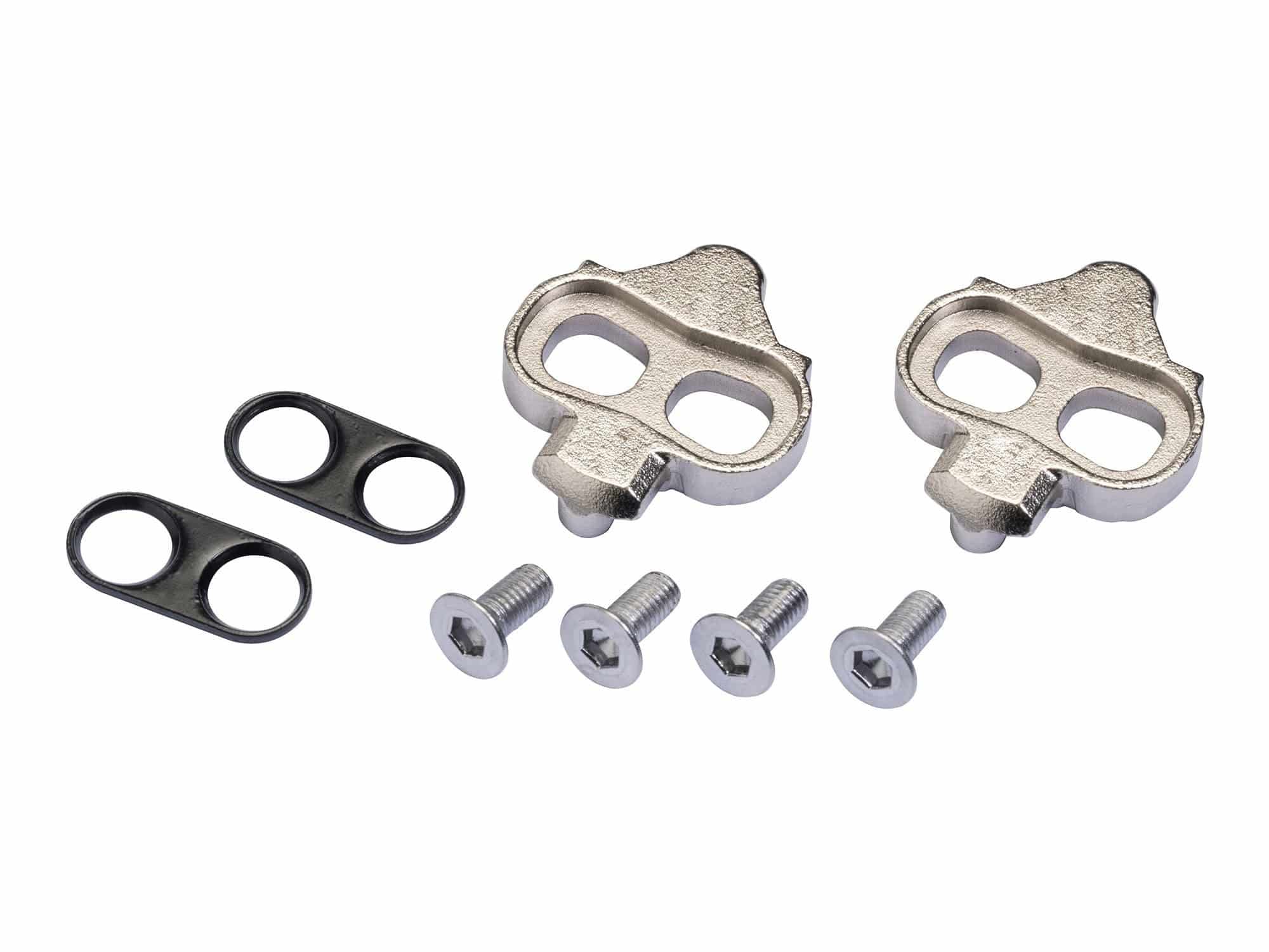 Giant pedal cleats for off-road clipless cycling shoes, compatible with Shimano SPD system, shown attached to cycling shoes.
