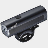 Infini KOR 400 front bike light with rechargeable 400 lumens, five lighting modes, mounted on a bicycle handlebar.