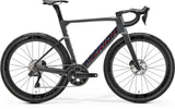 Merida Reacto 9000 Aero Road Bike with hydraulic disc brakes and wide tire compatibility, featuring aerodynamic frame and sleek design.