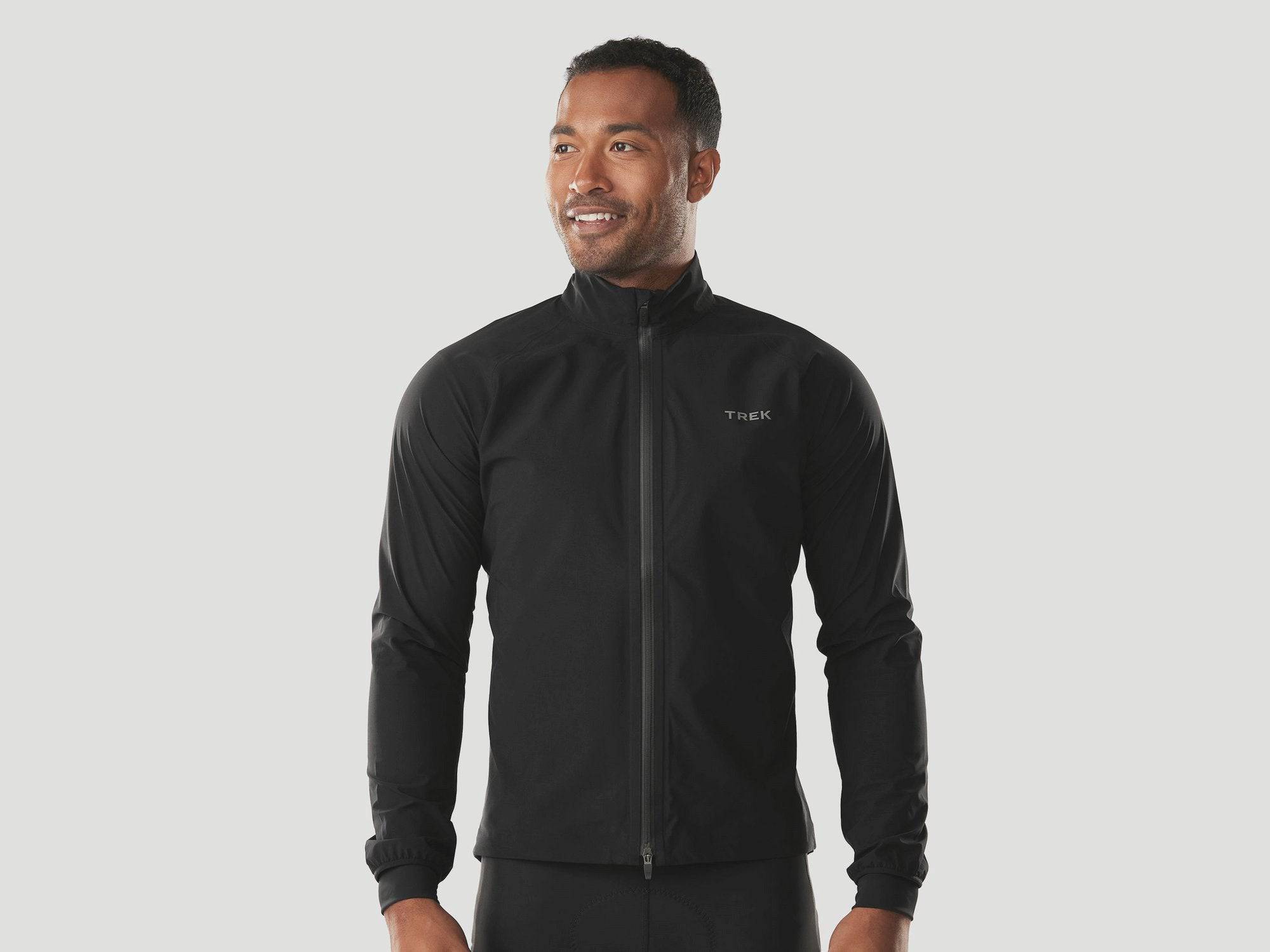 Trek Circuit rain cycling jacket, waterproof and breathable, shown folded and ready for all-weather rides.