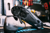 Shimano MT001 MTB SPD cleats with multi-entry design for mountain biking, gravel, and cyclocross pedals, showing the cleat profile.