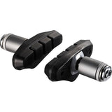 Shimano R50T2 BR-CX50 brake shoe pair with medium spacer and fixing bolts for bicycle brake system, shown with components and hardware.