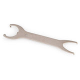 Park Tool HCW-18 bottom bracket wrench for one-piece cranks, USA-made, shown in a workshop setting