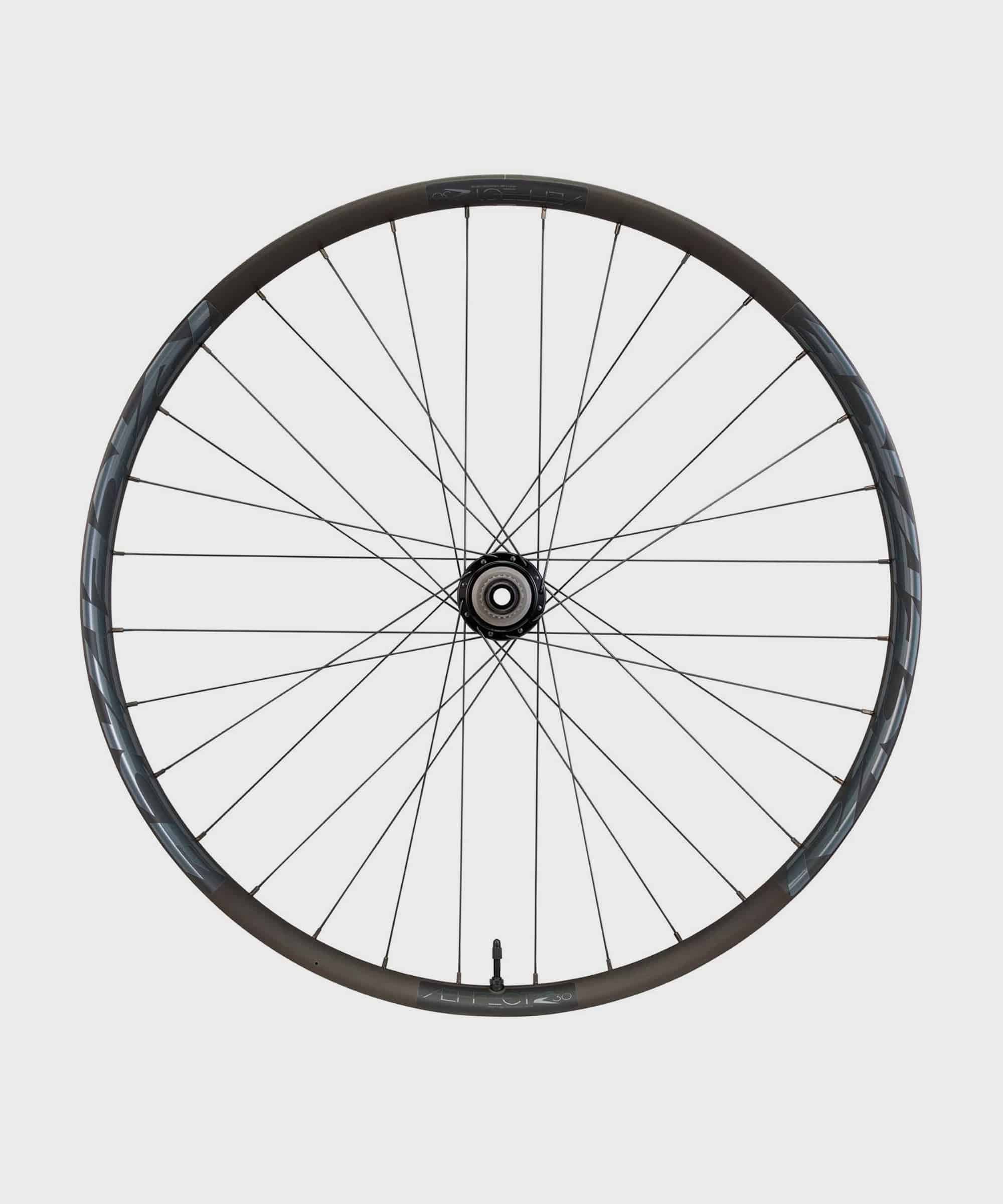 Race Face Affect R E-MTB rear wheel with 30mm tubeless-ready rim for 27.5 and 29-inch mountain bikes, shown from angle.