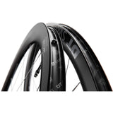 DT Swiss ARC 1400 DICUT rear carbon clincher disc brake wheel with 85x22mm rim, showcasing aerodynamic design and high-performance cycling component.