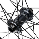 Shimano Deore XT M8200 27.5-inch front wheel with 15x110mm E-Thru hub and center lock disc for mountain bikes.