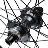 Shimano Deore XT M8200 27.5-inch rear wheel with 12-speed hub, 12x148mm center lock disc for mountain bike components.
