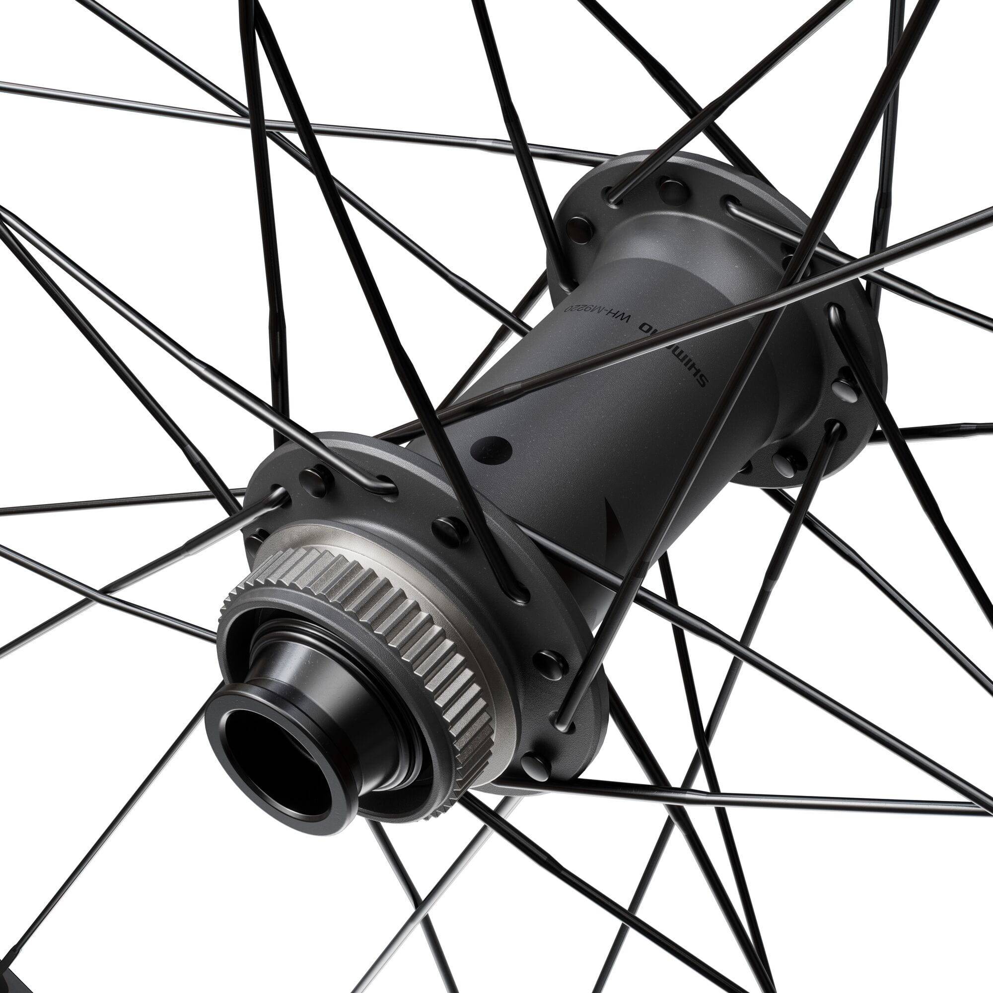 Shimano XTR M9220 29er front wheel with 15x110mm E-Thru axle and Center Lock disc for mountain biking.