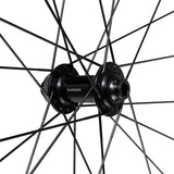 Shimano GRX WH-RX180 700C front tubeless-ready disc clincher wheel with 12x100mm axle, black alloy bike component.