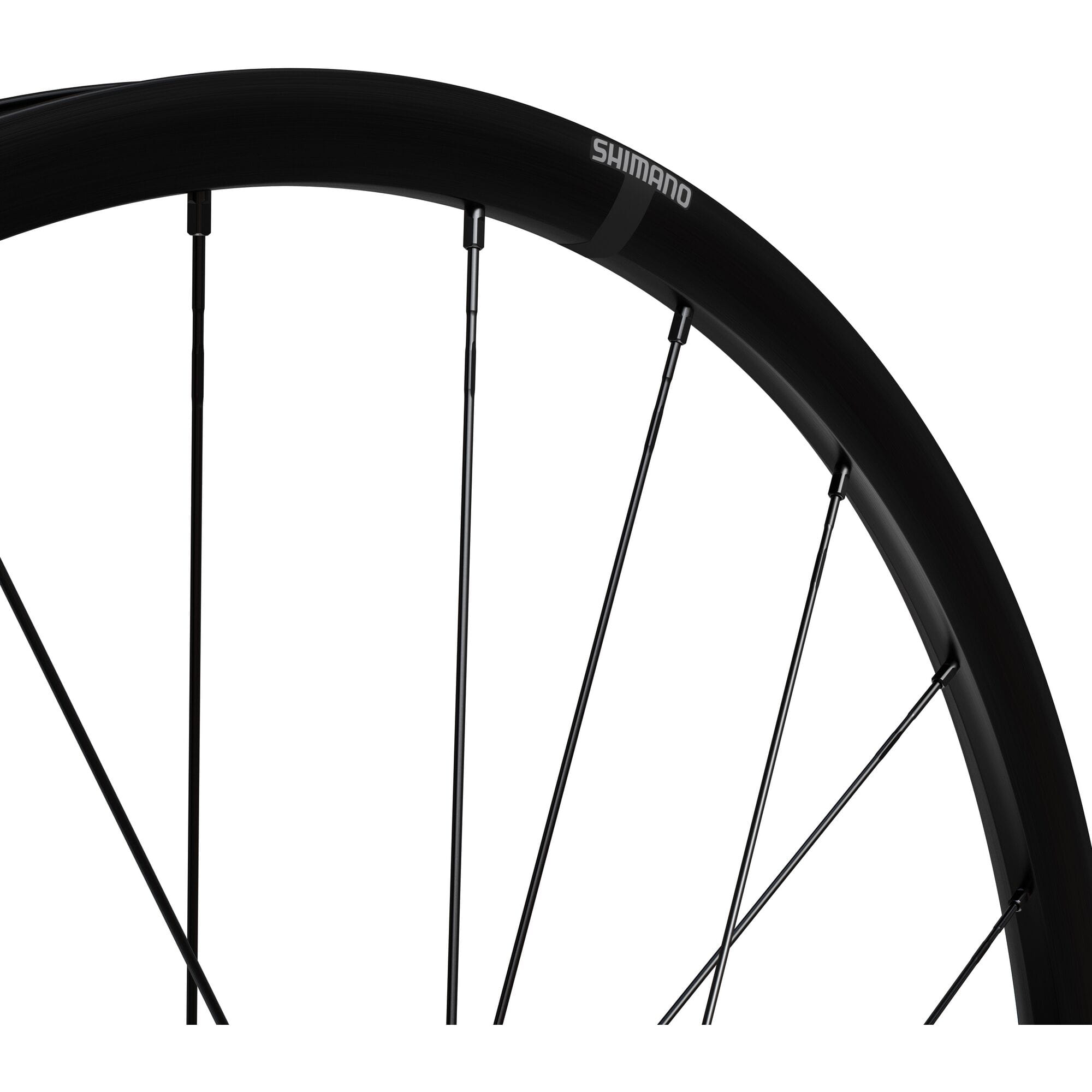 Shimano GRX WH-RX180 700C front tubeless-ready disc clincher wheel with 12x100mm axle and sleek black design.