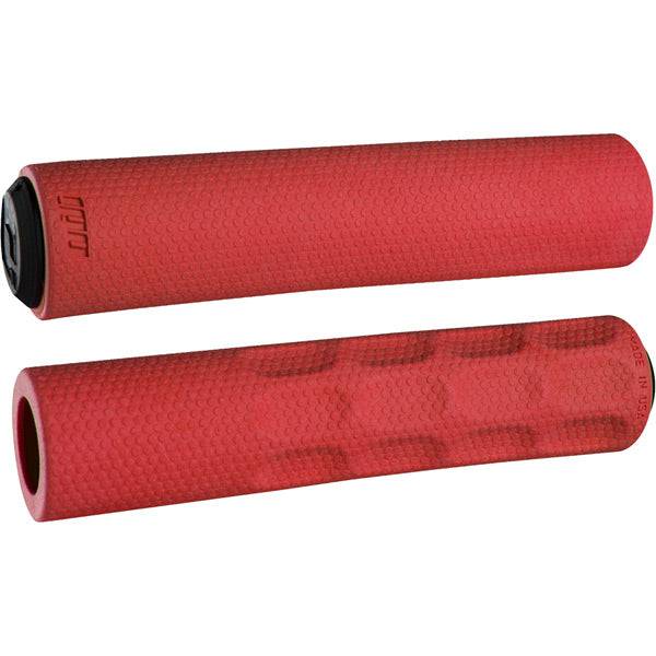 ODI Vapor Slip On MTB grips with ergonomic finger cutouts, designed for mountain bikes, showing textured rubber surface and grip pattern.