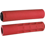 ODI Vapor Slip On MTB grips with ergonomic finger cutouts, designed for mountain bikes, showing textured rubber surface and grip pattern.